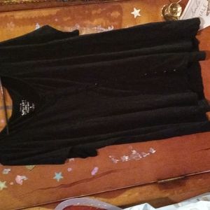 Torrid super soft knit tee shirt with false buttons going on size 4